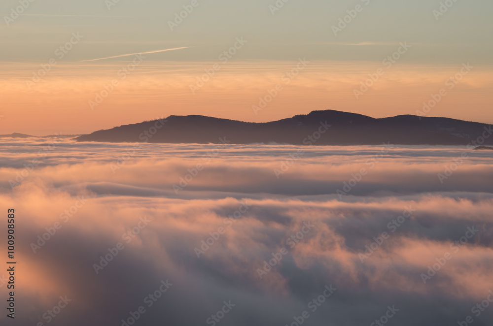 Carpathian mountains in the clouds, sunrise seen from Wysoka mountain in Pieniny, Poland