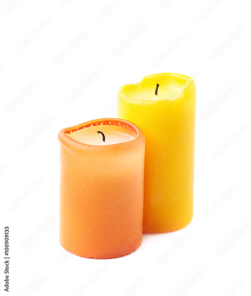 Pair of yellow and orange candles Pair of yellow and orange candles