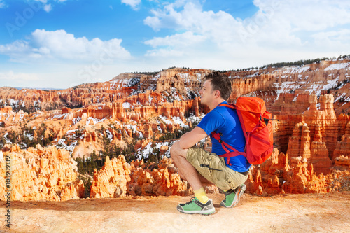 Hiker man take picture of Bryce canyon