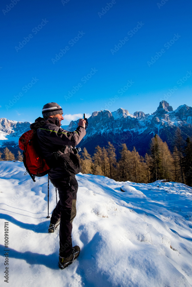 man photograph the mountains