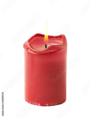Half-burned lit red candle isolated