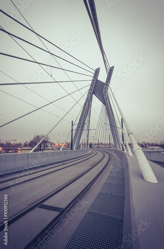 Tram cable-stayed bridge in Krakow, Poland - vintage look © tomeyk