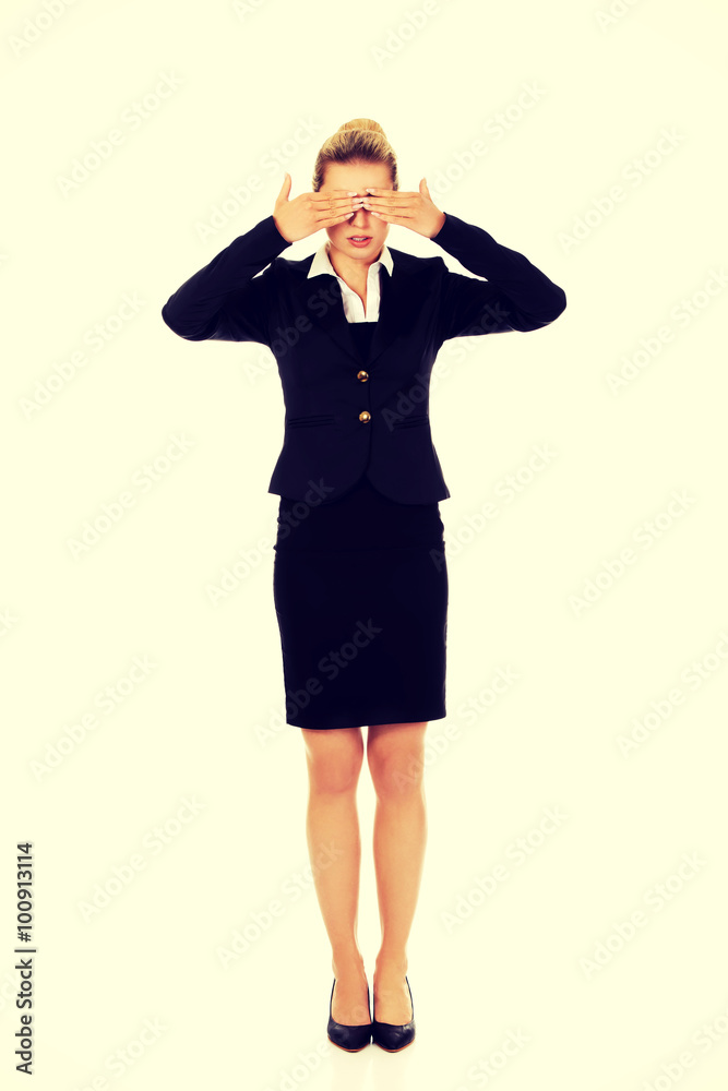Beautiful woman covering her eyes with her hands. Beautiful woman covering her eyes with her hands.