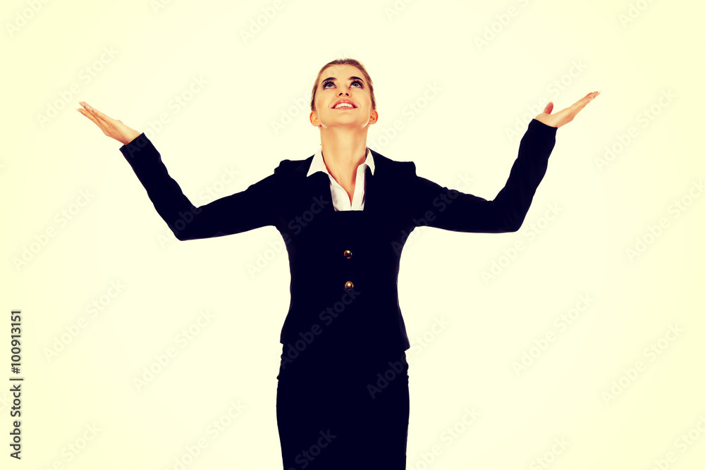 Businesswoman trying to catch something Businesswoman trying to catch something