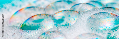 Clean blue soap bubbles and suds