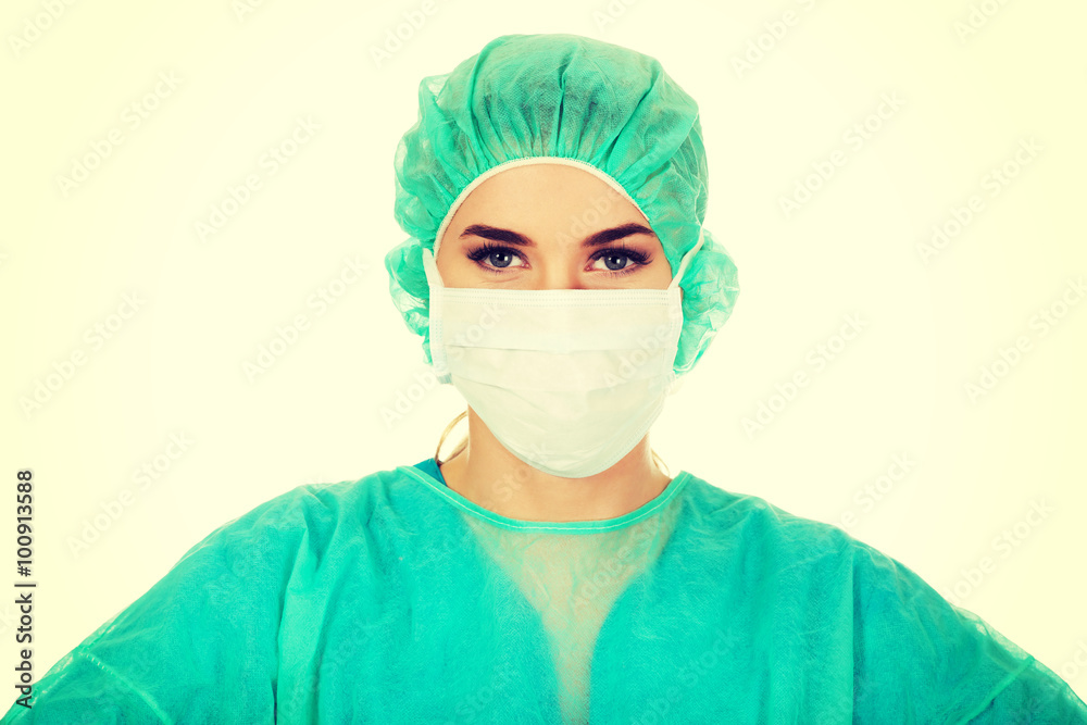 Female surgeon doctor in protective mask Female surgeon doctor in protective mask