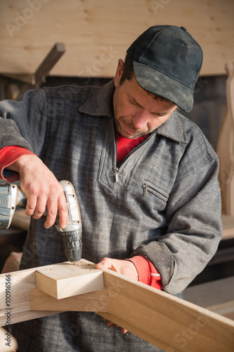 arpenter drills with a drill hole in the part photo