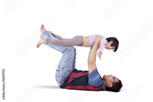 Man and his daughter playing together