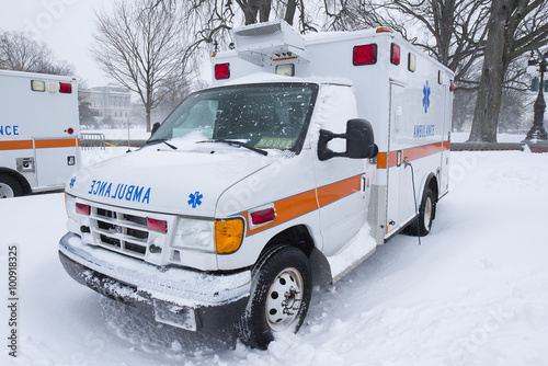 Ambulance covered snow
