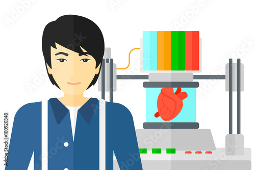 Man with three D printer.