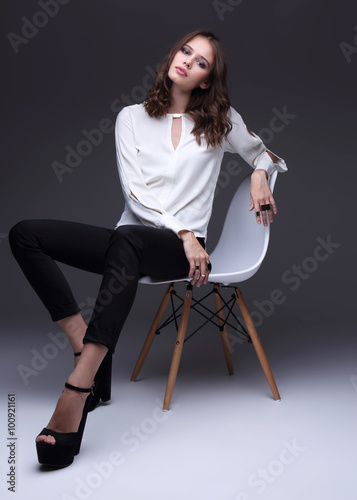 high fashion portrait of young elegant woman. Studio shot