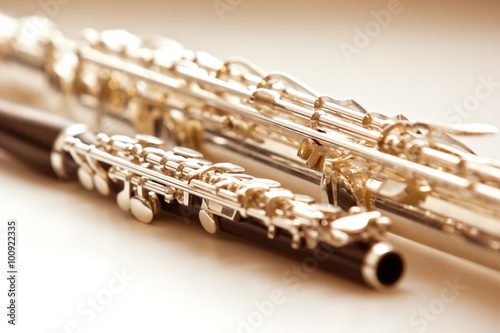 Valokuvatapetti Two flute close up lying on a light background