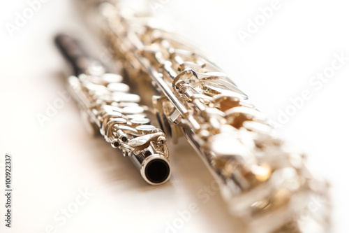 Two flute close up lying on a light background