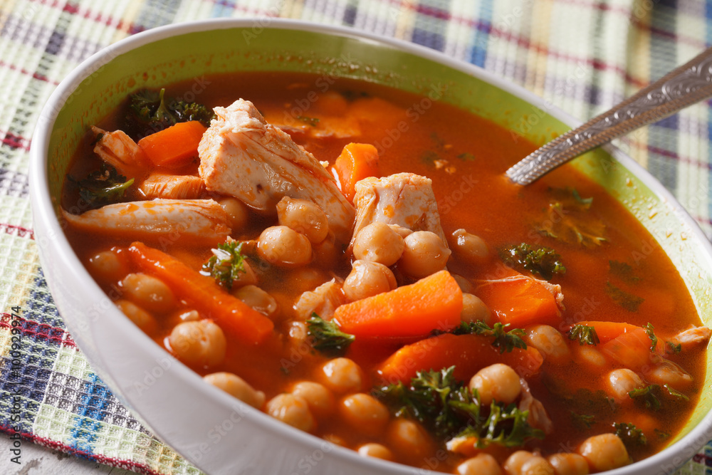 Delicious chickpea soup close up in a bowl. horizontal
Delicious chickpea soup close up in a bowl. horizontal