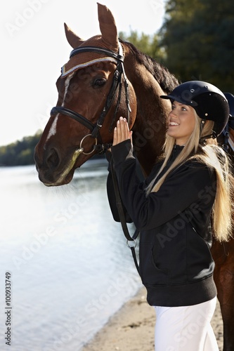 Outdoor portrait of horse and rider