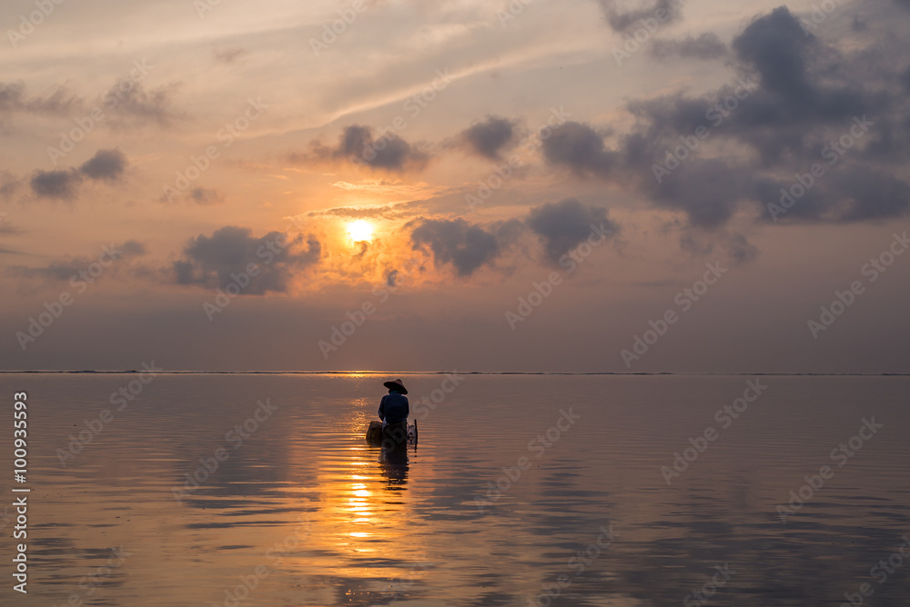 Beach / Ocean Sunrise in Sanur with traditional fisherman, Bali