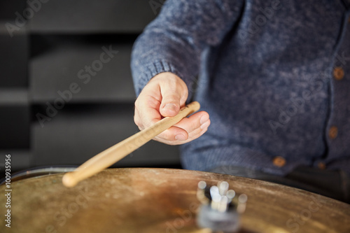 Drumstick and hand of drummer