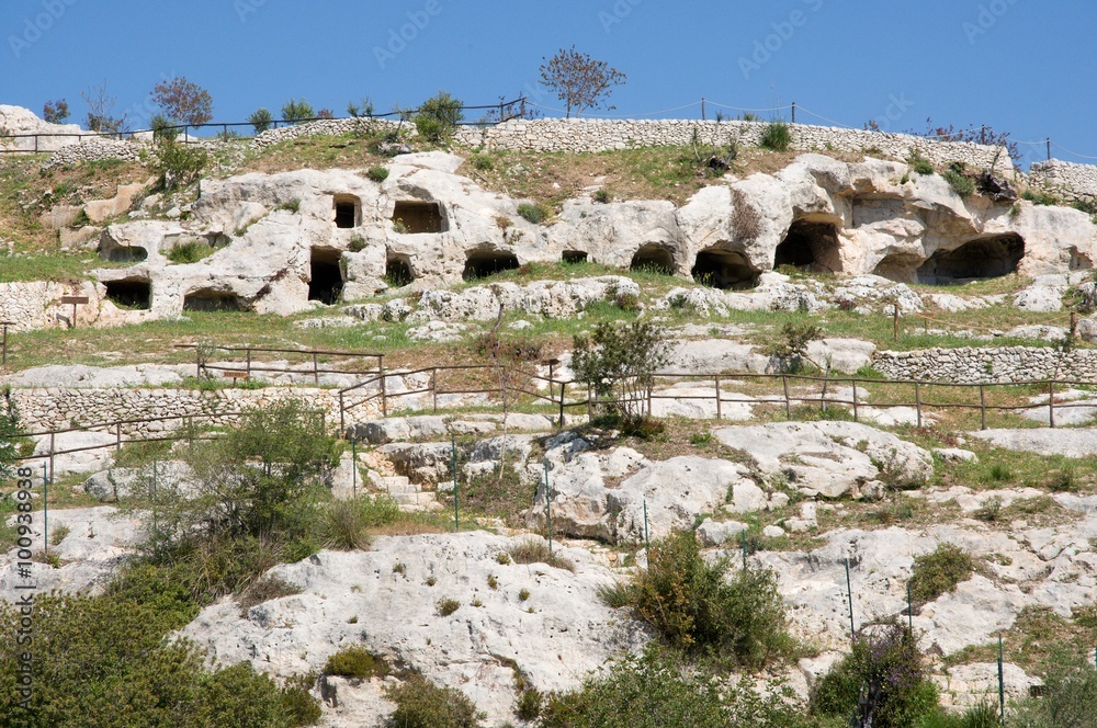 Siculi tombs at
the ruins of the medieval town of Noto Antica, destroyed by a major earthquake in 1693