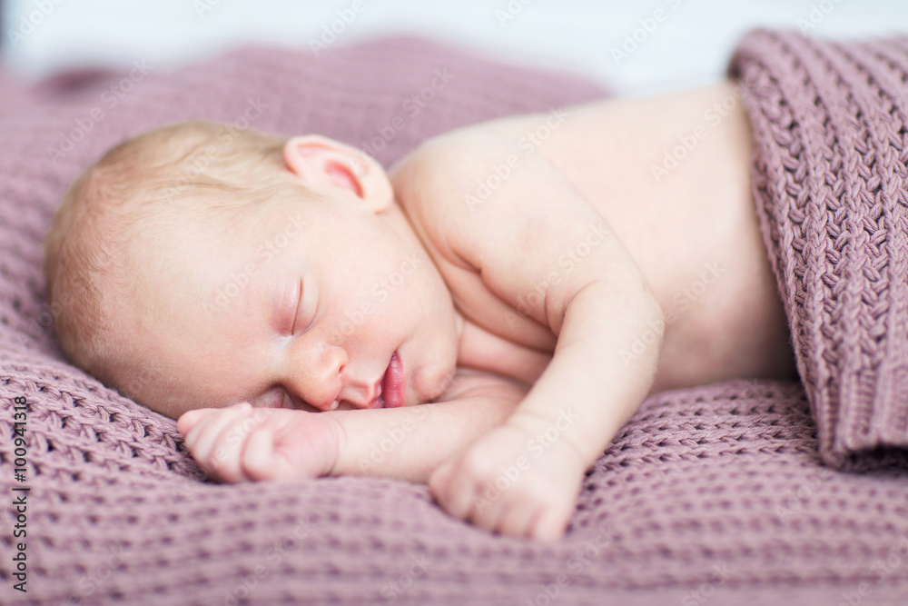 beautiful naked baby boy slipping on the brown blanket beautiful naked baby boy slipping on the brown blanket