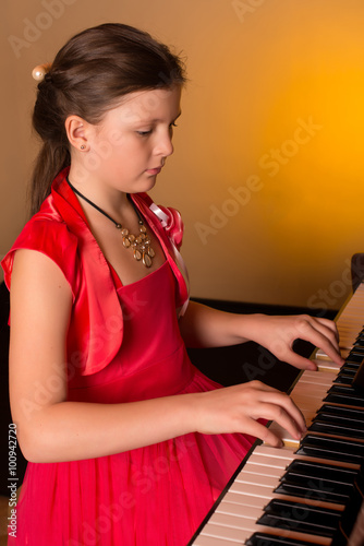 Piano player. Piano player. Girl Playing Piano.