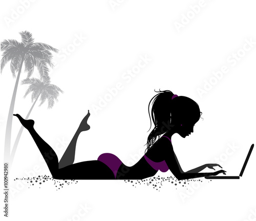 Girl with laptop on the beach