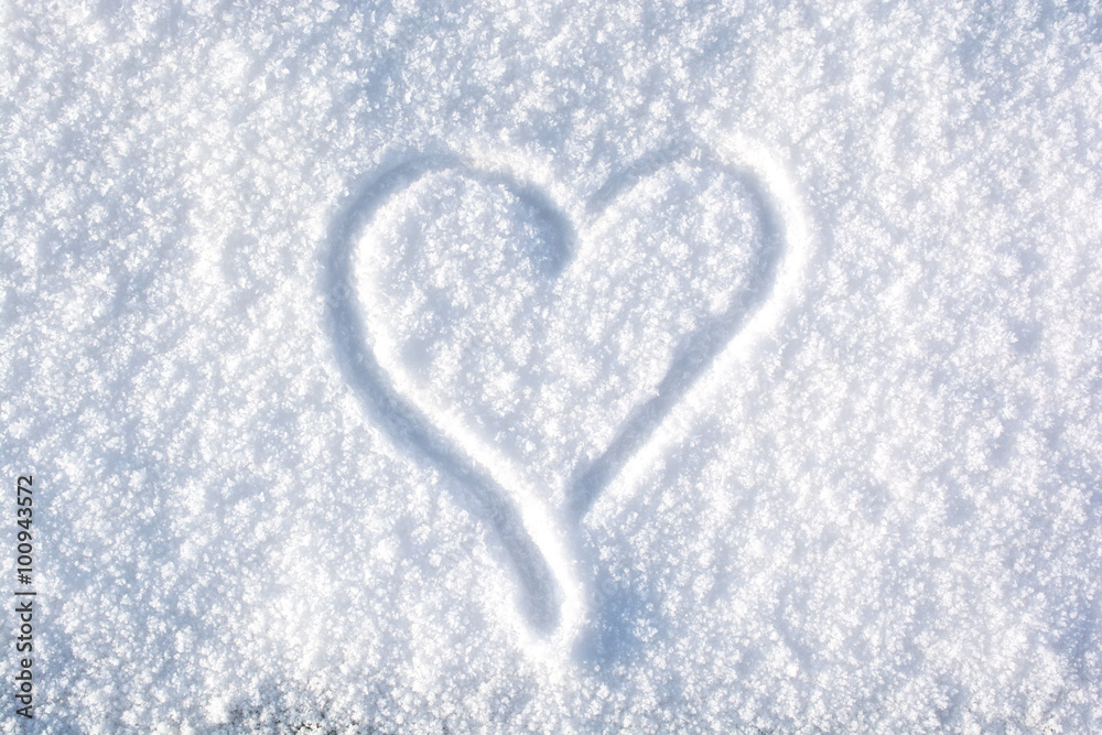 A drawing of a heart in the snow A drawing of a heart in the snow