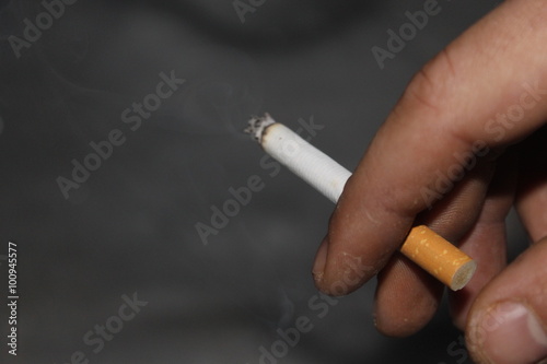 Cigarette in hand © olyasolodenko