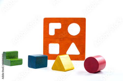 Φωτογραφία wooden blocks shape sorter toy isolated on white background