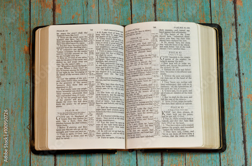 Bible opened to the Book of Pslams photo