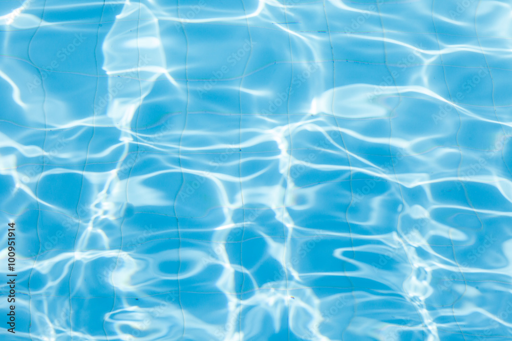 Blue ripped water in swimming pool / water background