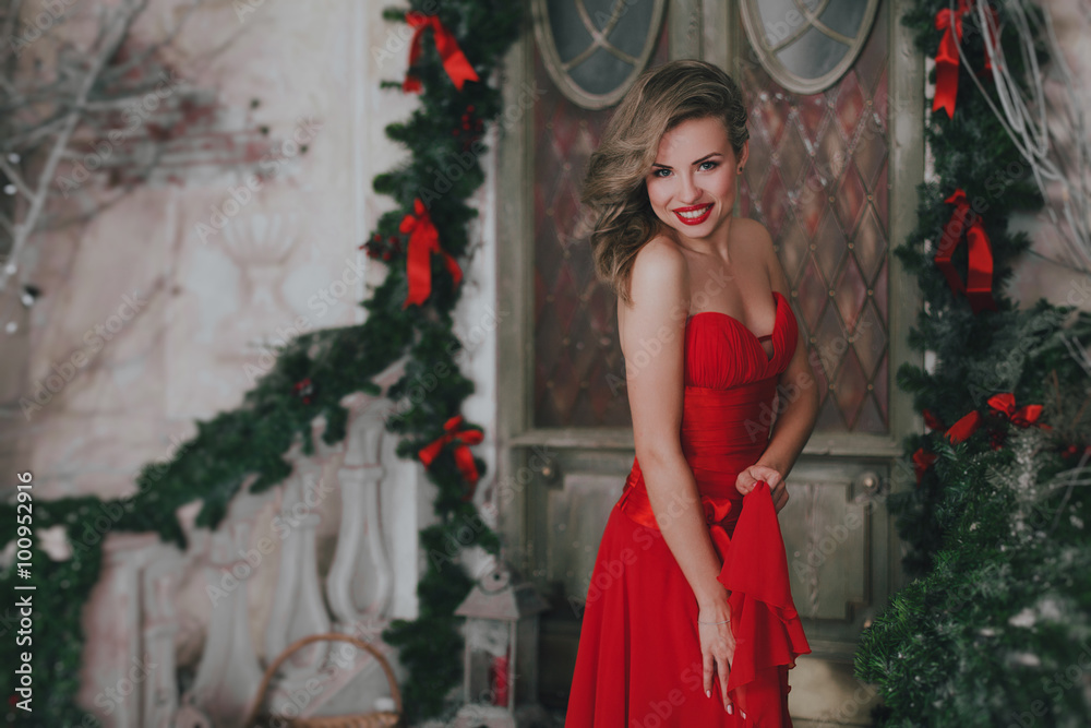 pretty woman in red in christmas time pretty woman in red in christmas time