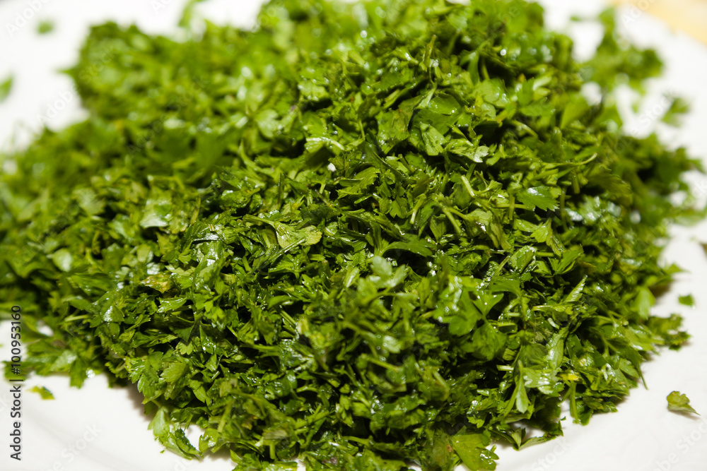 Closeup of chopped parsley with selective focus Closeup of chopped parsley with selective focus