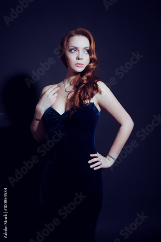 Elegant woman on black background