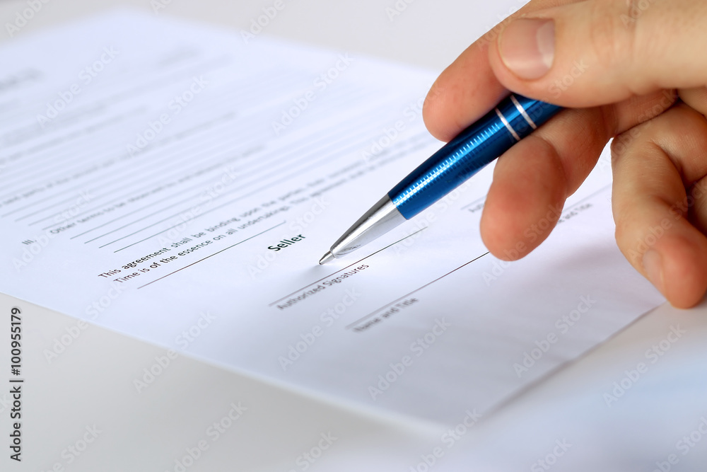 Businessman is signing a contract, business contract details Businessman is signing a contract, business contract details