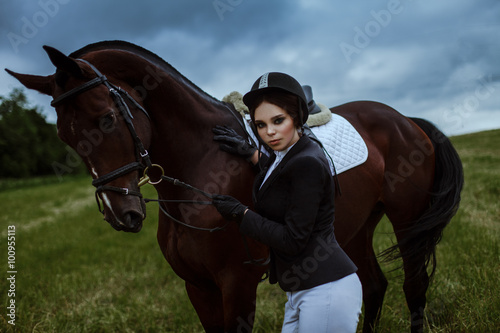 Fashion woman jokey and horse