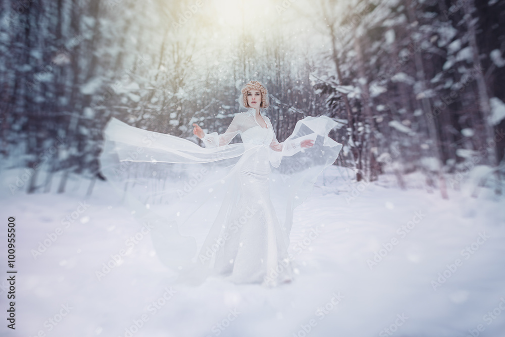 Mistery woman in winter forest