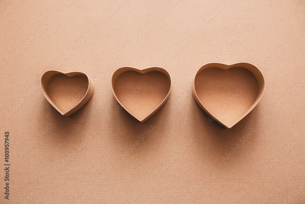 Fototapeta premium Boxes heart on kraft paper.