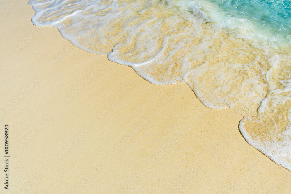 Soft wave of the sea on the tropical sandy beach