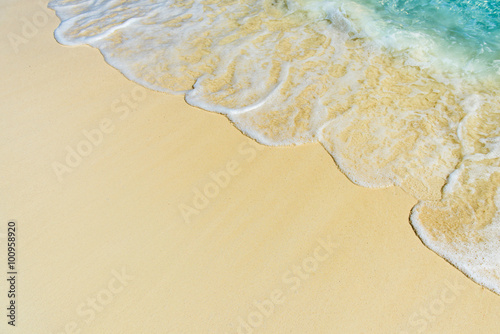 Soft wave of the sea on the tropical sandy beach