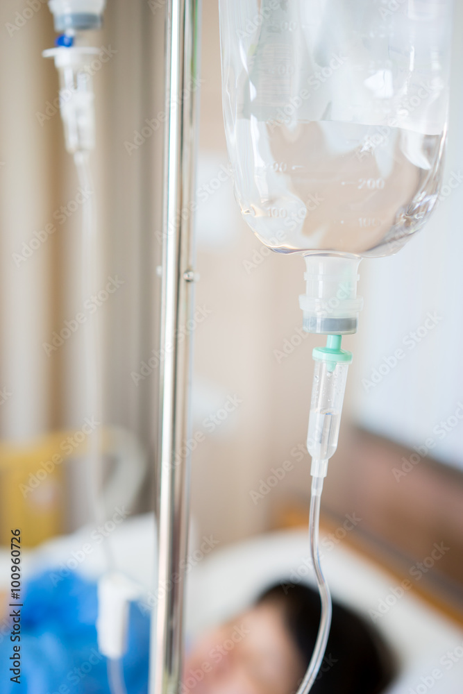 Asian woman patient on bed in hospital room Asian woman patient on bed in hospital room
