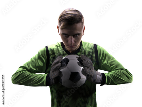 Foto Goalkeeper in green ready to save on white background