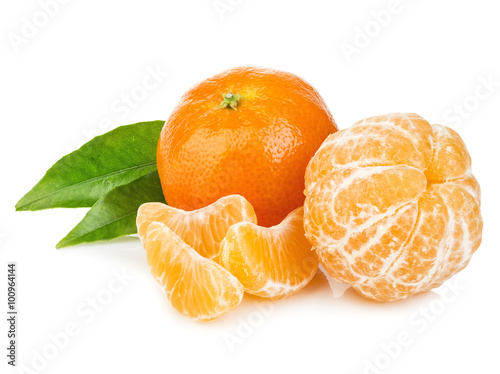 Ripe mandarin with leaves close-up on a white background. Tangerine orange with leaves on a white background.