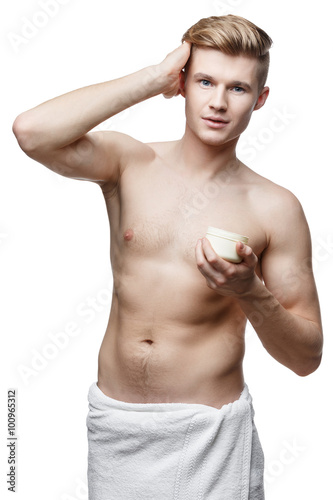 Young shirtless man isolated on white