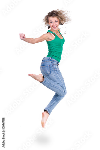 young dancer woman jumping against white background