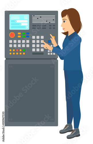 Engineer standing near control panel.