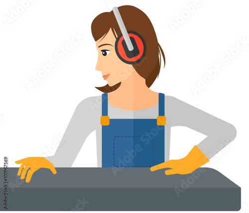 Woman working on steel-rolling mill.