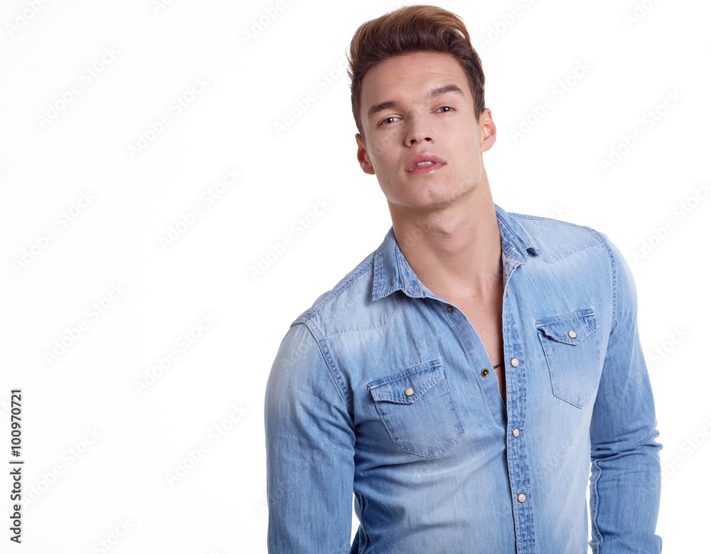Young men model posing in the studio Young men model posing in the studio