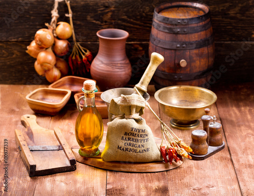 Slika na platnu various kitchen utensils on rustic wooden table