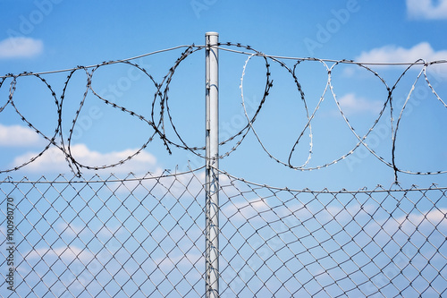 Barb wire fence set errected on the border of Croatia and Slovenia photo