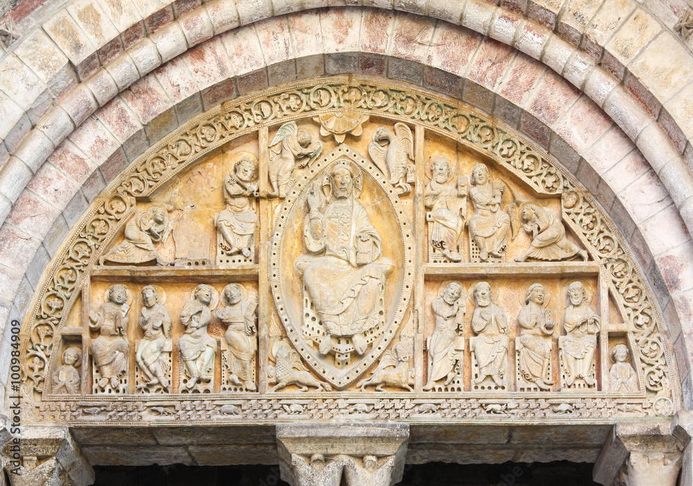 The famous 12th Century tympanum,  church of St Pierre, Carennac, Lot, France depicting the apostles